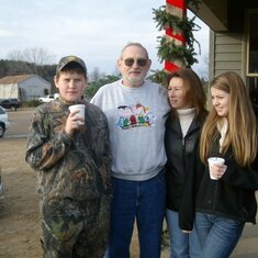 Stephen, Papa, Susan & Abbie - Chopping down the Christmas Tree - 2009