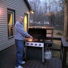 Dad - exactly where he loved to be - in front of the grill.  First grilled dinner in our new house - March 2011