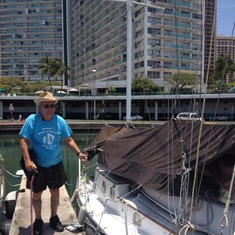 Bill's last day in Hawaii next to the boat he lived on for more than 40 years.