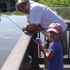 Ella fishing with Grandpa