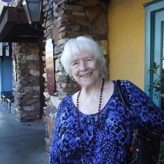 Billie Joan Buller, elegant, relaxed, and always beautifully dressed, smiling in front of Mimi's Cafe, Northridge, CA, 2011.