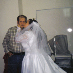 me kissing daddy on my wedding day