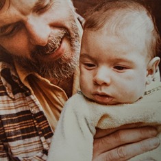 Dad and Blaine, at home, not long after first surgery to implant his tube for hydrocephalous (see the shaved head).