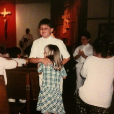 Amanda couldn't wait to hug Blake while he was walking back to his pew after his first communion! So sweet!!