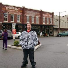 Blake in the town where the Jack Daniels Distillery is located. He was laughing at Nanu not wanting her picture taken lol. (Dec. 2008).