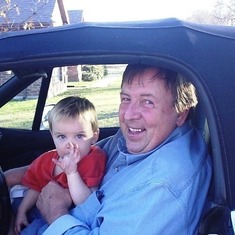 Happy. Grandpa and James...spent hours in the Beemer.