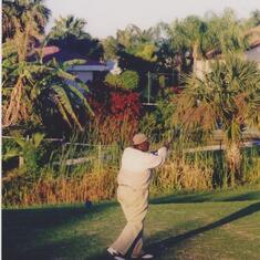 Robert playing golf in Hawaii