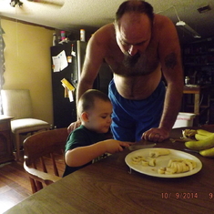 Bobby teaching Jaydan how to make Banana pancakes Oct 2014