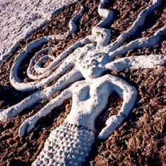 Sand mermaid on Sanibel Island. Designed by Bobby, constructed with Amelia, Claire, and Bruce.