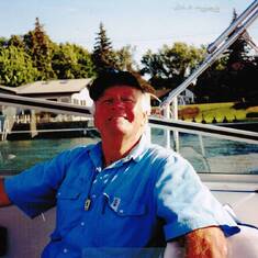 Ah, yes ... all I need is another Genny Creme Ale!  (Bob on his Viking IV Sea Ray at his dock on Grand Island, NY)