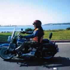 Doesn't get much better than this!  Here is Bob, riding his Harley Softail along San Diego Bay, with Point Loma in the background.