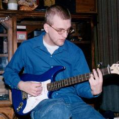 Bradley with his first Electric guitar. 