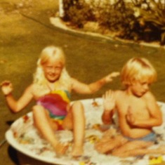 Brandi and Me in the pool again at grandma's house
