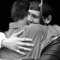  Brandon giving Preston a hug on graduation day