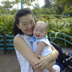 With mommy in the garden
