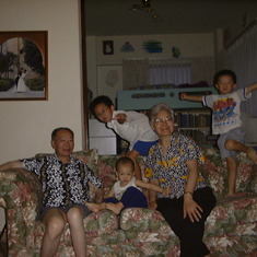 With grandparents at home in Singapore - March 7, 2003