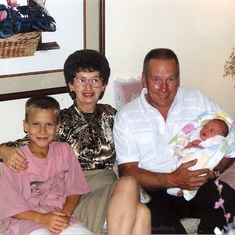 Brent, grandma Pansy, grandpa Ed, and baby Sam