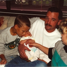 Brent, baby Samantha, Uncle Rick and Missy