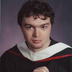 Brian's official graduation photo from the College of New Jersey. It has been continuously on our refrigerator ever since.