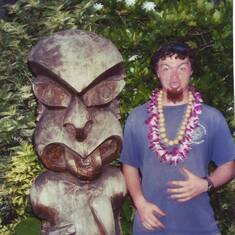 Before Brian graduated from high school, we did a family cruise to Hawaii. Brian couldn't resist mimicking this tropical statue.
