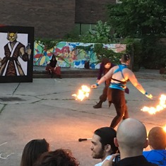 Brian and Mom in the audience watching fire spinners battle it out at the Capital Fringe Festival (July 2017)