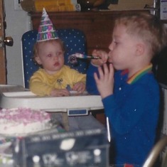 We always had birthday parties, with home-made and home-decorated cakes, without fail. This is Brian at Diana's one year party.