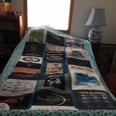 This is a lovely memorial quilt made out of Brian's t-shirts
