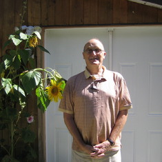 Brian outside our home in Alcona
