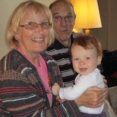 Granny Sandy and Grandpa Brian with Baby Ella