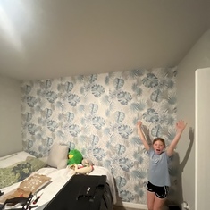 I spent 4 hours hanging that wall paper in her new room. 

Turned out great!