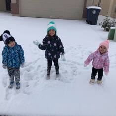 Liam, Aurora, Emery are so big. They made snow angels today. So cute