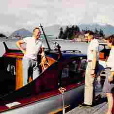 Brian McLoughlin in his boat with friend Don Brown and Sarah 1958