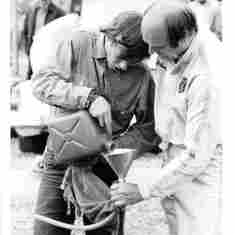 Brian and Michael his Pitcrew refuel the Race Car 1973