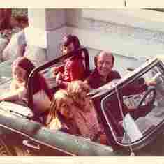 Margo with friends enjoy a ride in the Brian Triumph Sports Car 1970