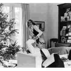 Margo surprises Brian with a Christmas gift 1974