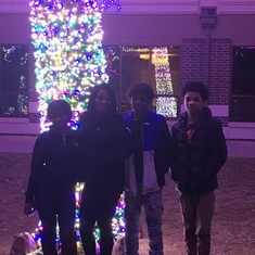 Bryant with his mom and siblings at the Magic tree.