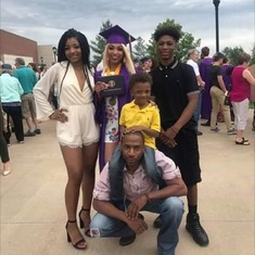 Bryant with his dad, sisters and younger brother at his sister’s graduation ceremony.