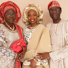 Buky with mom and dad at her engagement ceremony (2014)