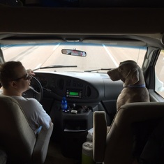 Pilot with his copilot. Pippin loved riding in the front seat next to Byron.