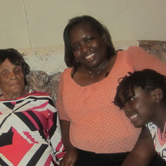 Simone with her grandmother and daughter; being the centre of love.