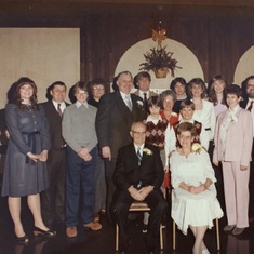 Camille's in-laws celebrating a 50th milestone anniversary. Camille is 4th from left.