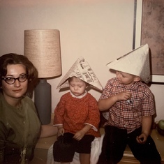 Camille with Kenny A and Stephanie enjoying paper hats