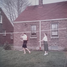 An oldie but goodie - Camille and sister-in-law Wyva playing badminton in the yard of Kenneth J and Helen Van Kirk
