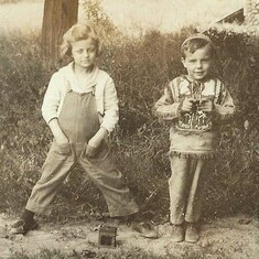 Carmen and her brother Jose.  She was about five or six years old.  A little "Tomboy"!