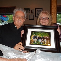Momma and Papa Joe given a picture from Anne and Geno