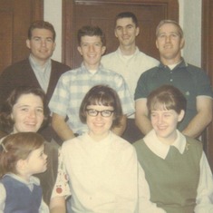Boys and girls: First row - Carol (with Katherine on her lap), Kathi, Sally; Second row - Dean Curry, Bill Markley, Jim Owens, Derrell Slatten