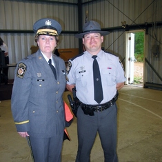 Kevin along side PA State Police Officer  - At Camp Cadet for Tony - 2002