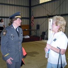 Carole  talking with Sate Police officer - at Camp Cadet for Tony - 2002