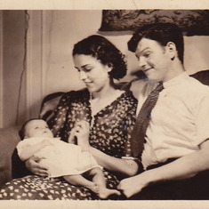Carole at 3 months old with parents May and Hall