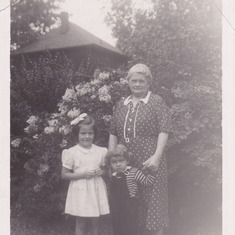 Not sure who the girl on the left is. Carole is in overalls with great grandmother, Elizabeth (Ostertag) Stover.